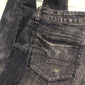 Skinny distressed jeweled jeans